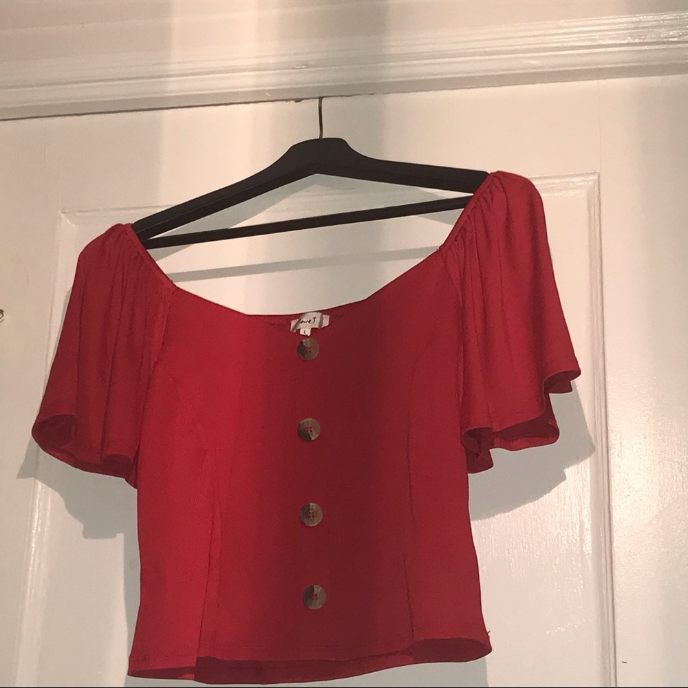 A red crop top.